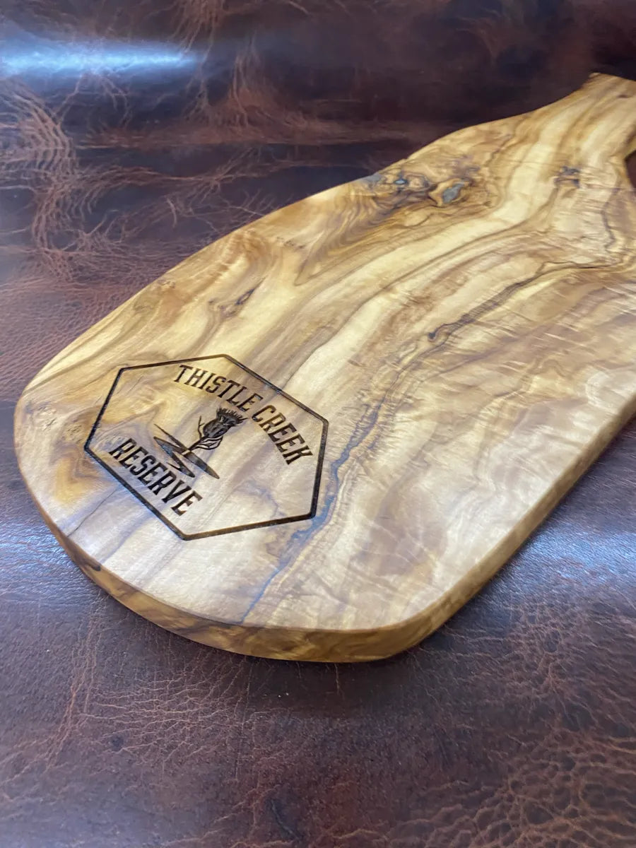 wooden cutting board with logo