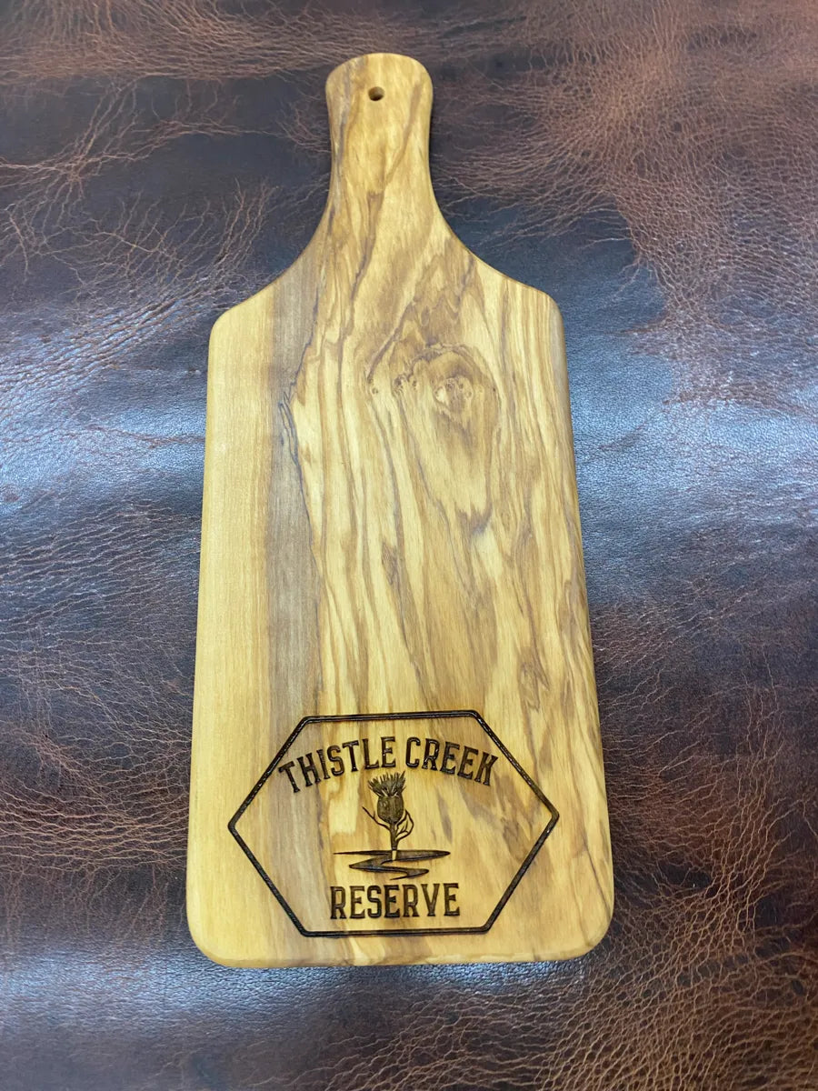 wooden cutting board with logo