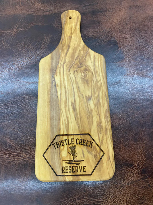 wooden cutting board with logo