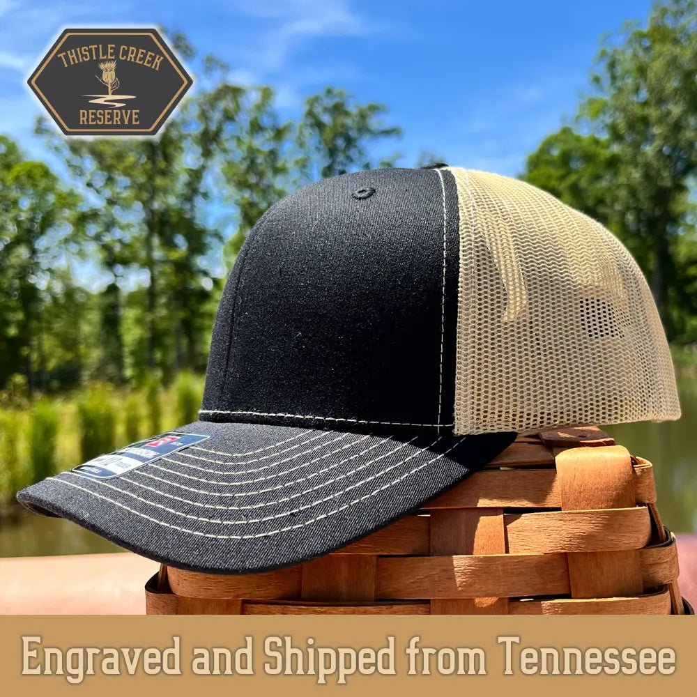 black an khaki hat