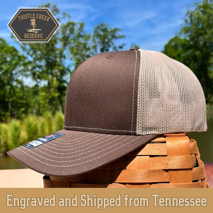 brown and khaki hat