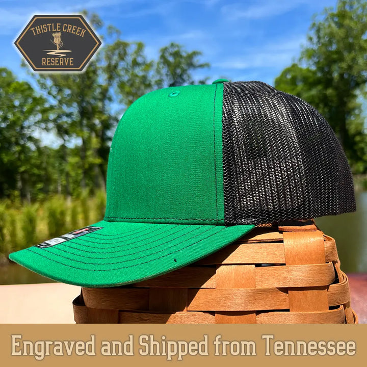 green and black hat