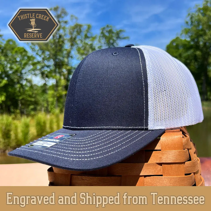 navy blue and white hat