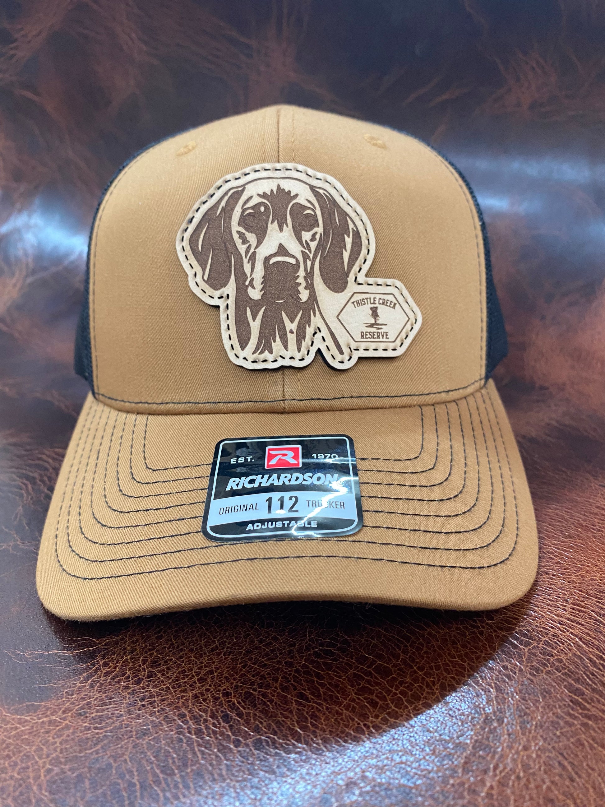 hat with dog patch