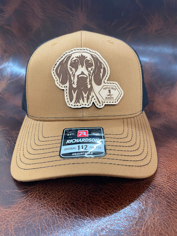 hat with dog patch