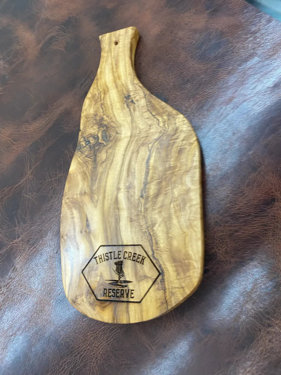 wooden cutting board with logo